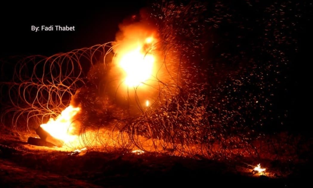 פורעים בגבול עזה. צילום: Fadi Thabet