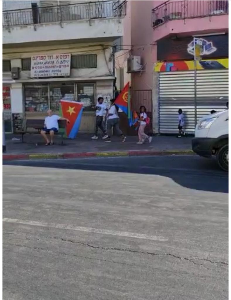 פליטים? צפו במסתננים מאריתריאה במצעד שמהלל את המשטר
