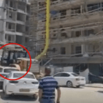 קרב באתר הבנייה: טרקטור הפך רכב בזעם, שוטרים הותקפו | תיעוד
