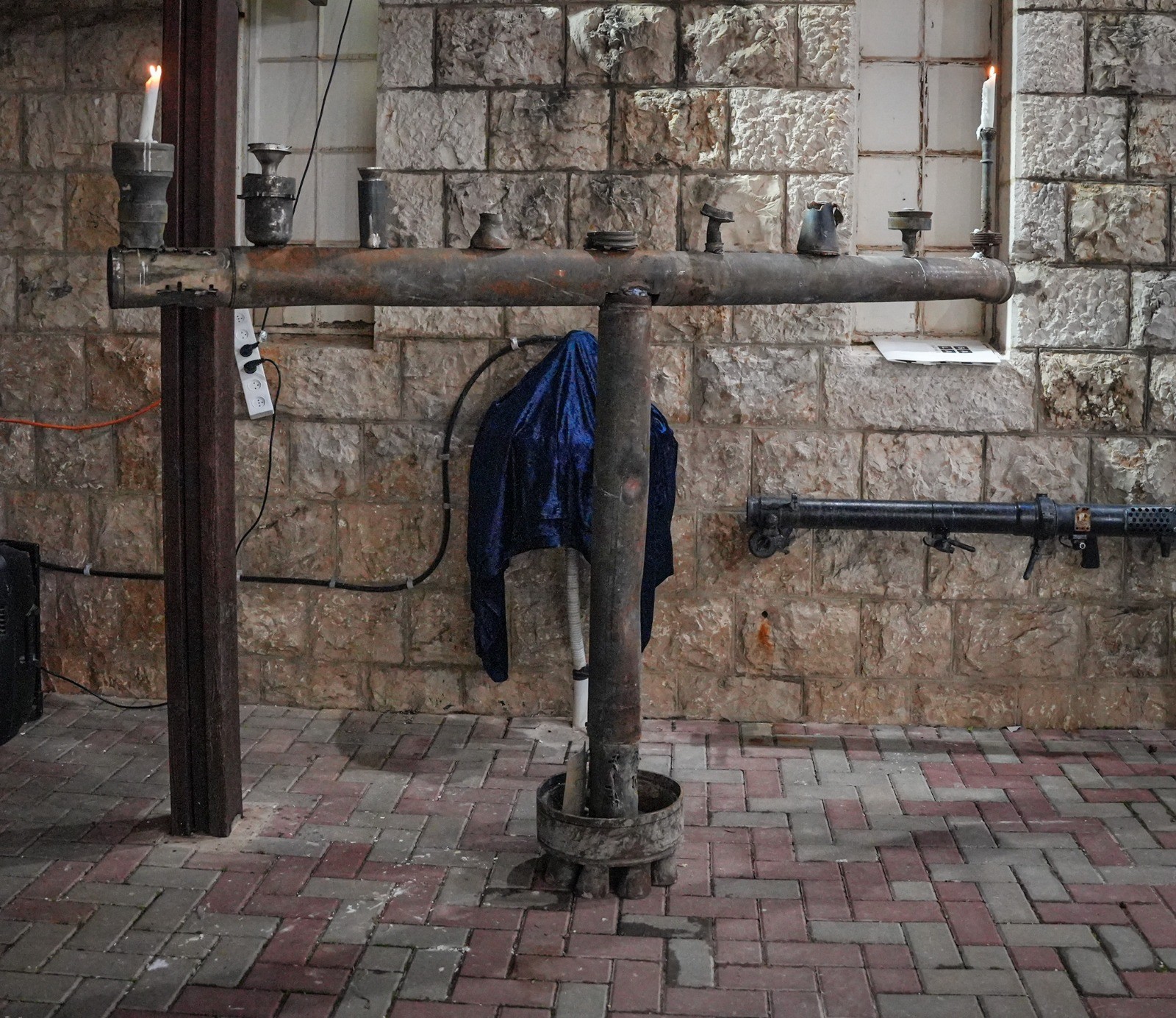 לזכר נרצחי הצפון: חנוכייה מחלקי טילים הודלקה בקריית שמונה