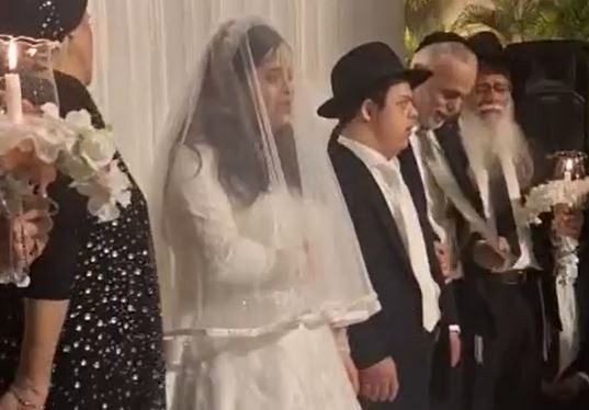 אור של חנוכה: זוג עם תסמונת דאון נישא באירוע יוצא דופן