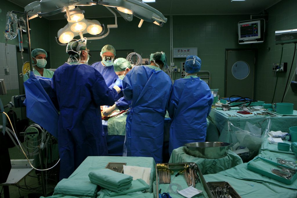 An Israeli medical staff of surgeons and nurses conduct open heart surgery in an Israeli hospital